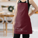 Minimalist Fun Quote Name Burgundy Christmas Apron<br><div class="desc">Minimalist Fun Quote Name Burgundy Christmas. Simple elegance with this fully customisable design. Easily personalise with your name and keep the festive themed quote Sleighing it in the Kitchen or change as required. The text,  background and straps can be changed to any colours of your choice.</div>