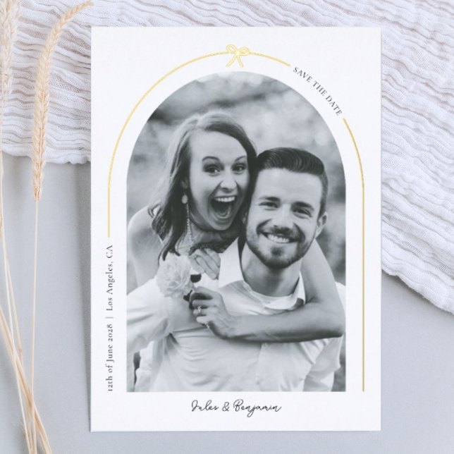 Minimalist Gold Arch with Bow Photo Save the Date Foil Holiday Card (A minimalist save the date photo card in black and white with a foil arch and little bow detail)