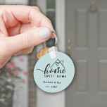 Minimalist Home Sweet Home Personalised New Home Key Ring<br><div class="desc">Celebrate your new space with our personalised "Home Sweet Home" keychain! Featuring a light blue background and a relaxed, casual font, this simple yet charming design is perfect for presenting the keys to your new front door. The soft colour palette and minimalist style make it ideal for any type of...</div>