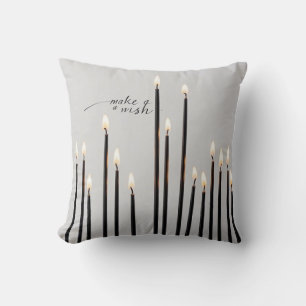 Minimalist lit black-line candles flames cushion