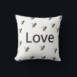 Minimalist "Love & Bees" Throw Pillow – Romantic<br><div class="desc">This elegant throw pillow features a minimalist design with the word "Love" at its centre, surrounded by a charming bee pattern. A perfect accent for any room, this pillow adds a warm and romantic touch to your home décor. Ideal as a gift for Valentine's Day, anniversaries, weddings, or simply as...</div>