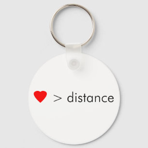 minimalist "love is greater than distance"  quote key ring