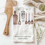 Minimalist Mistletoe Personalised Christmas Tea Towel<br><div class="desc">Add a touch of minimalist elegance to your kitchen this holiday season with this personalised Christmas kitchen towel. Featuring mistletoe and hanging utensils in a simple, rustic design, this towel is perfect for those who appreciate understated holiday decor. Personalise it with your name to make it a unique addition to...</div>