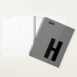 Minimalist Monogram Initial Grey Black Planner<br><div class="desc">Masculine Planner, with your choice of initial and editable year. This minimalist design features oversized sans serif typography in black on a grey background. The template is set up for you to change the letter and edit the year. If you wish to edit the colours as well, please click "customise...</div>