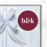 Minimalist Monogram Initials Burgundy Red Wedding Classic Round Sticker<br><div class="desc">Modern,  minimal,  minimalist wedding design with big bold letters in tone colour: Burgundy,  red  (colour,  font,  text,  size can be changed).  With date and bride and groom monograms,  monogrammed (initials).  Stickers / seals for wedding invitation envelopes. Perfect for that young couple for fall/autumn wedding.</div>