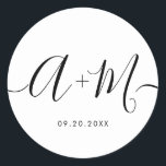 Minimalist Monogram Script Custom Wedding date Classic Round Sticker<br><div class="desc">Elevate your wedding details with the Minimalist Monogram Script Custom Wedding Date Sticker. This elegant and personalised sticker adds a touch of sophistication to your wedding stationery, allowing you to showcase your monogram and wedding date in a simple yet impactful way. The sticker features a minimalist script design that exudes...</div>