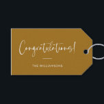 Minimalist Mustard Yellow Custom Congratulations Gift Tags<br><div class="desc">A sophisticated and timeless gift tag featuring an mustard yellow background with elegant script and modern typography in white. Perfect for adding a personalised touch to wedding gifts,  baby showers,  graduations,  or any celebratory occasion. Customise with your family name or message for a stylish and thoughtful finishing touch.</div>