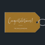 Minimalist Mustard Yellow Custom Congratulations Gift Tags<br><div class="desc">A sophisticated and timeless gift tag featuring an mustard yellow background with elegant script and modern typography in white. Perfect for adding a personalised touch to wedding gifts,  baby showers,  graduations,  or any celebratory occasion. Customise with your family name or message for a stylish and thoughtful finishing touch.</div>