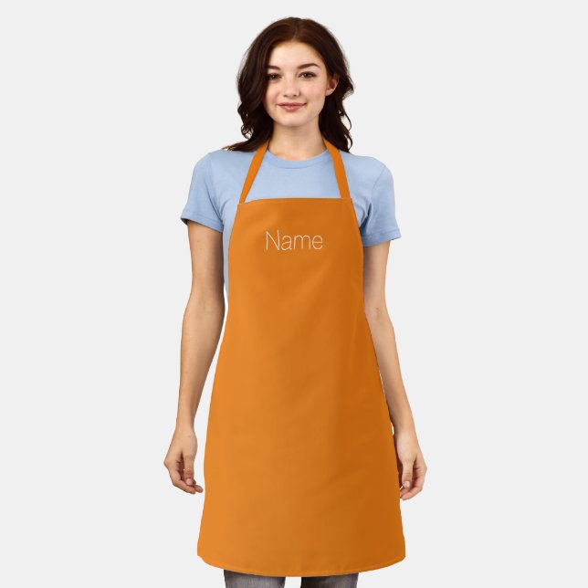 Minimalist orange custom name text monogram apron (Worn)