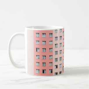 MINIMALIST PHOTOGRAPHY OF PINK HIGH-RISE BUILDING COFFEE MUG