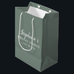 Minimalist Sage Green and White Bridal Shower      Medium Gift Bag<br><div class="desc">The Sage Green and White Bridal Shower Gift Bag brings a touch of elegance with its soft sage green colour and clean white text. This minimalist design keeps it simple yet stylish, making it a perfect choice for presenting gifts at a bridal shower. The understated aesthetic allows the message to...</div>