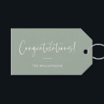 Minimalist Sage Green Personalised Congratulations Gift Tags<br><div class="desc">A sophisticated and timeless gift tag featuring a sage green background with elegant script and modern typography in white. Perfect for adding a personalised touch to wedding gifts,  baby showers,  graduations,  or any celebratory occasion. Customise with your family name or message for a stylish and thoughtful finishing touch.</div>