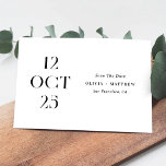 Minimalist Simple Black & White Photo Wedding Save The Date<br><div class="desc">Announce your wedding date in timeless style with this minimalist black and white Save the Date card. The front showcases a bold, editorial date layout with refined serif typography, while the back features space for a favourite photo for a meaningful personal touch. The clean monochrome design feels modern, elegant, and...</div>