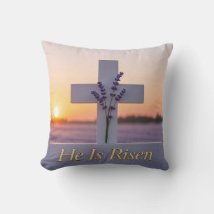 Minimalist white cross adorned with lavender cushion