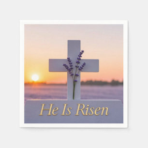Minimalist white cross adorned with lavender napkin