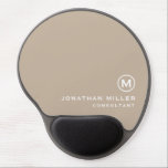 Minimalistic Modern Monogram Beige Gel Mouse Pad<br><div class="desc">This minimalistic and modern gel mouse pad is the perfect addition to any office or workspace. The sleek design features a monogram in classic block typography, adding a touch of personalisation, on a beige background. The gel wrist rest provides comfort and support during long hours of work. The non-slip base...</div>