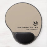 Minimalistic Modern Monogram Gel Mouse Pad<br><div class="desc">This minimalistic and modern gel mouse pad is the perfect addition to any office or workspace. The sleek design features a monogram in classic block typography, adding a touch of personalisation, on a beige background. The gel wrist rest provides comfort and support during long hours of work. The non-slip base...</div>