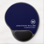 Minimalistic Modern Monogram Navy Blue Gel Mouse Pad<br><div class="desc">This minimalistic and modern gel mouse pad is the perfect addition to any office or workspace. The sleek design features a monogram in classic block typography, adding a touch of personalisation, on a navy blue background. The gel wrist rest provides comfort and support during long hours of work. The non-slip...</div>