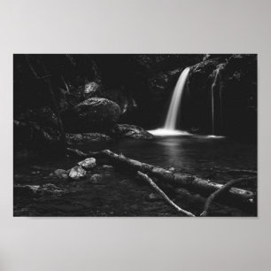 Minimalistic waterfall behind broken tree in black poster
