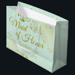 Mint Green & Gold Lace Maid of Honour Chic Wedding Large Gift Bag<br><div class="desc">This beautiful gift bag is designed as a wedding gift or favour bag for the Maid of Honour. It features a beautiful mint green background with golden faux foil lace curls and swirls in the corners. The gold script lettering reads "Maid of Honour" with a place to enter her name,...</div>