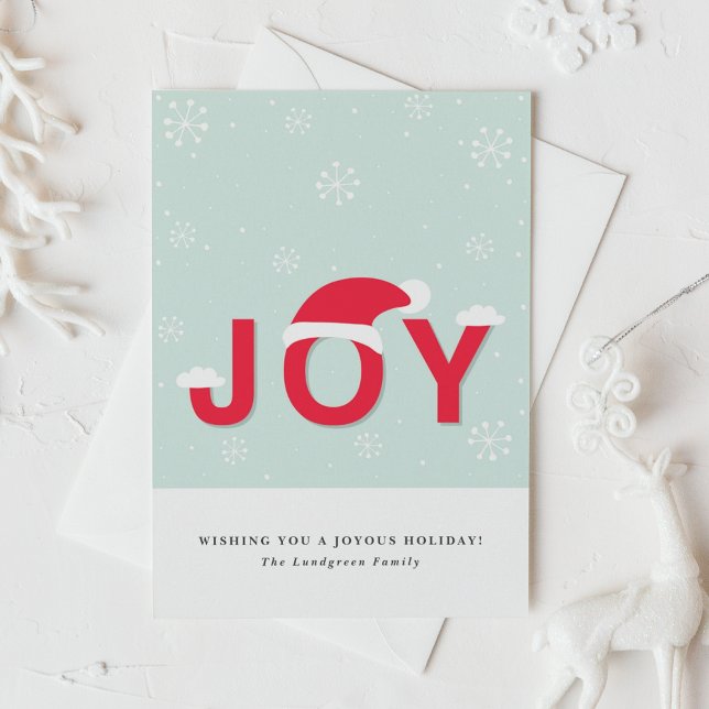 Mint Snow Joy Holiday Greeting Card (This holiday card design showcases the word “JOY” in lettering, playfully topped with a Santa hat.)