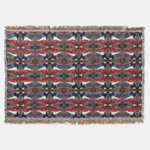 Mirror image generating repeated shape, over white throw blanket