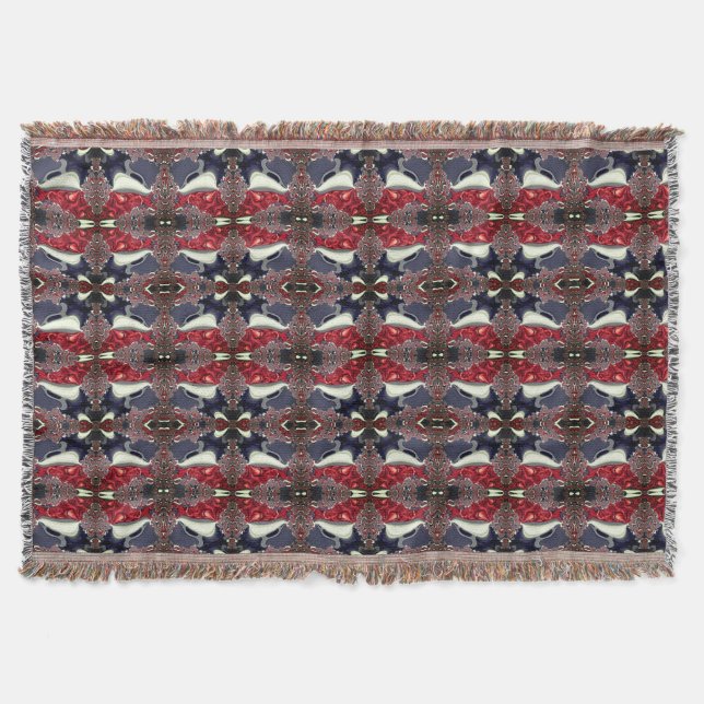 Mirror image generating repeated shape, over white throw blanket (Front)