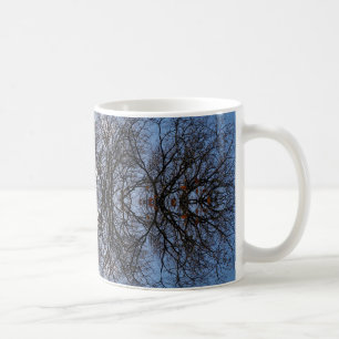 Mirror image trees coffee mug