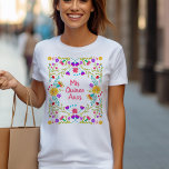 Mis Quince Anos Mexican Fiesta Floral Quinceanera T-Shirt<br><div class="desc">Pretty Quinceanera T-Shirt, which you can personalise with your name on the back, if you wish. Colourful floral design with Mexican fiesta flowers and pink, hand lettered typography. The wording reads "Mis Quince Anos" - perfect as a 15th birthday party gift or for the Quinceanera to wear during all the...</div>