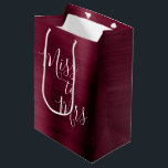 Miss to Mrs Bridal Shower Party Burgundy Metallic Medium Gift Bag<br><div class="desc">From Miss to Mrs Bridal Shower or Bachelorette Party Purple Burgundy Metallic Brushed Metal Modern and Elegant Girly Cute Gift Bag. The From Miss to Mrs. Bachelorette Party Gift Box uses the popular cranberry background and grey typography. If you need additional customised matching items,  please contact the designer.</div>