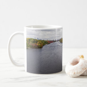 mississippi river and wooded banks in minneapolis coffee mug
