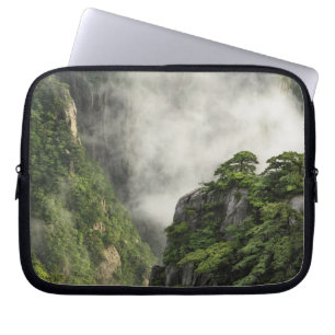 Mist among the peaks and valleys of Grand Canyon Laptop Sleeve