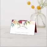 Mistletoe Manor Chic Seating Wedding Table Number Place Card<br><div class="desc">Mistletoe Manor Watercolor Lush Winter Roses Design with Hand Painted Florals, Holly Berry Leaves, Pine Sprig Foliage, and Watercolor Paint Brush Strokes. Colourful Marsala, Wine Merlot Red, Burgundy, Ivory Cream, and Green. With Swirly Chic Typography Brush Script Fonts, and Elegant floral Border - Wedding Reception Guest Seating Table Number Place...</div>