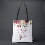 Mistletoe Manor Watercolor Mother of the Groom Tote Bag<br><div class="desc">Mistletoe Manor Watercolor Lush Roses Design with Hand Painted Florals, Holly Berry Leaves, Pine Sprig Foliage, and Watercolor Paint Brush Strokes. Colourful Marsala, Wine Merlot Red, Burgundy, Ivory Cream, and Green. With Swirly Chic Typography Brush Script Fonts and Elegant Floral Top Border - Mother of the Bride Tote Bags! ~...</div>