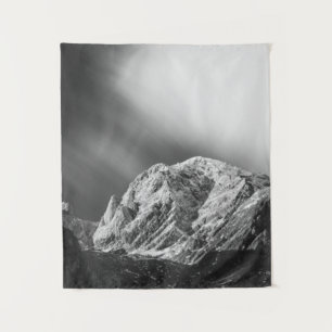 Misty clouds over the mountains in black and white tapestry