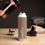 Mocha Personanlized Wedding Bridesmaid Water Bottle<br><div class="desc">Gift your wedding bridesmaid or maid of honour with this trendy, vacuum Insulated water bottle that features her name in white, stylised script on a trendy mocha brown colour background designed to match your wedding colour scheme. Personalise bottle by editing and replacing name with your own as desired. Select your...</div>