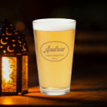 Mocha Stylised Wedding Groomsman Name Glass<br><div class="desc">Beer glass for the wedding groomsman that features his name printed in dark maroon,  stylised script inside a trendy mocha colour oval border along with wedding date. A great party supply idea for a bachelor party! Personalise your beer glass by editing and replacing name and date with your own.</div>