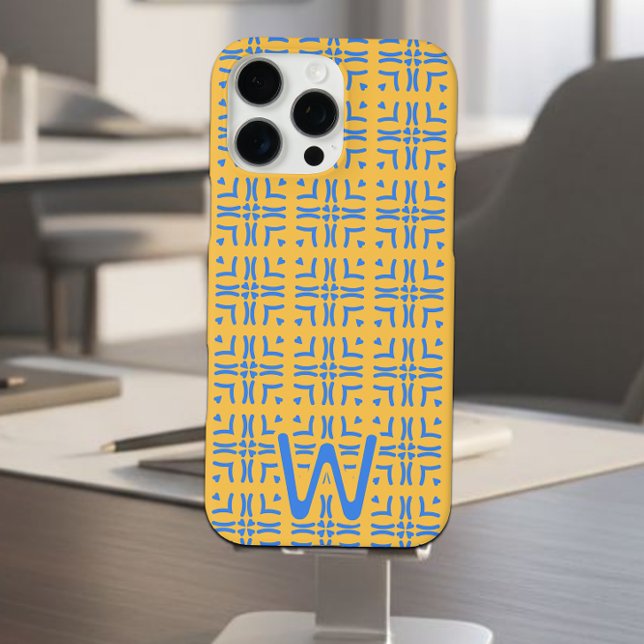 Mod Blue Hearts Tiled Mustard Monogram Case-Mate iPhone Case (Blue and mustard tiled hearts pattern iPhone case on a cell phone stand on a desk.)