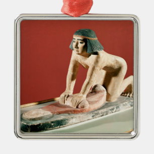 Model of a woman grinding grain, Old Kingdom Metal Ornament