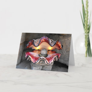 Model pearl in shell holiday card