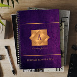 Modern 2026 gold monogram name script elegant planner<br><div class="desc">A classy elegant business or personal 2026 purple planner featuring gold copper metallic geometric monogrammed square label on a leather look background. Perfect for a stylish business image for a business corporate manager, director, fashion stylist, home interior decorator, designer, architect, beauty salon manager, makeup artist, hairstylist. Easy to personalise with...</div>