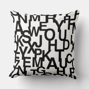Modern, abstract, messy pattern with letters cushion
