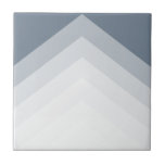 Modern and bold, triangle pattern ceramic tile<br><div class="desc">This modern wall tile features a striking chevron pattern composed of layered gradient stripes in elegant shades of grey and blue. Its clean lines and geometric shapes add depth and visual interest to the design. This tile is an excellent choice for bringing a sophisticated and stylish pop of personality to...</div>
