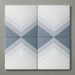 Modern and bold, triangle pattern ceramic tile<br><div class="desc">This modern wall tile features a striking chevron pattern composed of layered gradient stripes in elegant shades of grey and blue. Its clean lines and geometric shapes add depth and visual interest to the design. This tile is an excellent choice for bringing a sophisticated and stylish pop of personality to...</div>