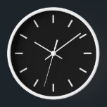 Modern Black and White Clock<br><div class="desc">A modern wall clock with a black face features white 5 minute graduation marks in white and a white frame.</div>