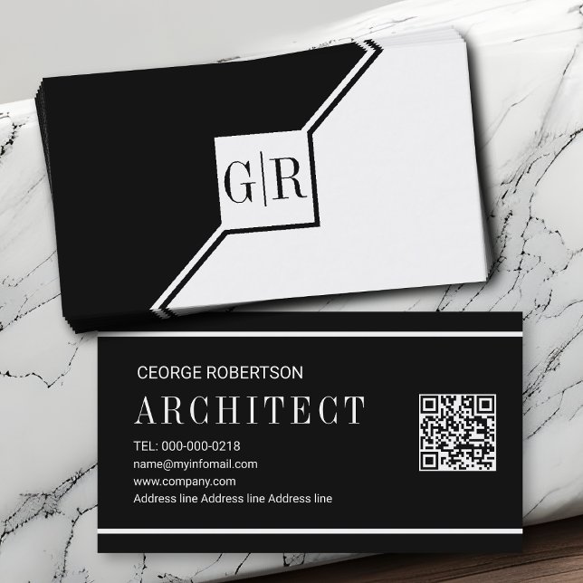 Modern black and white monogram geometric business card (Creator Uploaded)