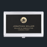 Modern Black Brushed Metallic Gold Monogram Business Card Holder<br><div class="desc">Elevate your professional look with this stylish and practical business card case. Featuring a brushed monogram medallion with your name company and title in classic block typography, this case is a great way to keep your business cards organised and protected. The black background adds a touch of sophistication, while the...</div>