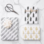 Modern Black & Gold Happy Hanukkah Trees Wrapping Paper Sheet<br><div class="desc">Stylish and festive,  this gift wrap set is the perfect way to wrap all your presents for friends and family this holiday season.  The set features 3 different designs: 1. Black calligraphy "Happy Hanukkah, " 2. black hand drawn evergreen trees,  and 3. gold hand-painted,  evergreen trees.</div>