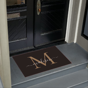 Modern Black Gold Monogram Feminine Script Name Doormat