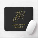 Modern Black Gold Monogram Mouse Pad<br><div class="desc">Keep your workspace stylish and functional with this Modern Black Gold Monogram Mouse Pad. The sleek design features a customisable monogram on a black background, and the non-slip rubber base ensures a secure grip on any surface. Perfect for both personal and professional use, this mouse pad is a great way...</div>